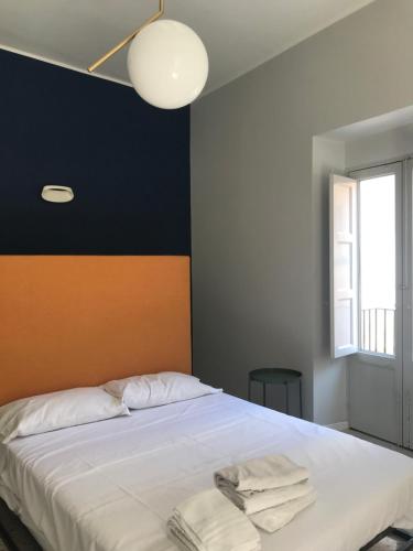 Posteľ alebo postele v izbe v ubytovaní Dimora San Camillo