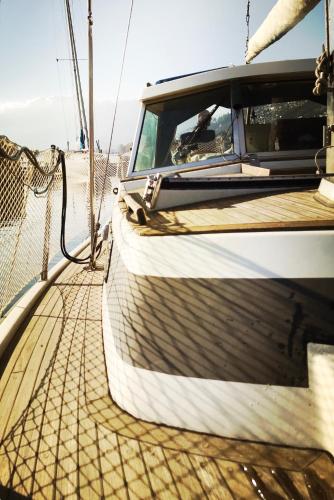 a boat sitting on the deck of a boat at Winga Sailboat, Do-Minus Design Retreat & SPA in Locarno