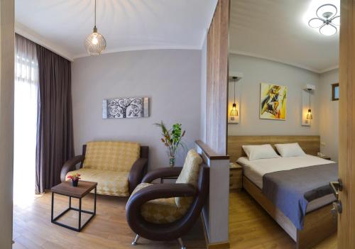 Ein Bett oder Betten in einem Zimmer der Unterkunft Hotel Livin