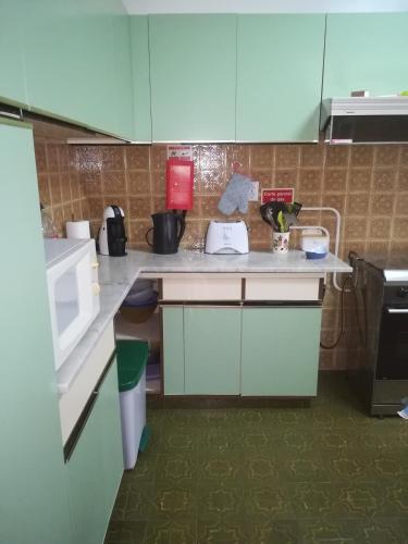 Dapur atau dapur kecil di quartos da praia