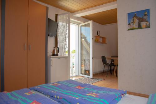 Postel nebo postele na pokoji v ubytování Zielona Okiennica Chillout