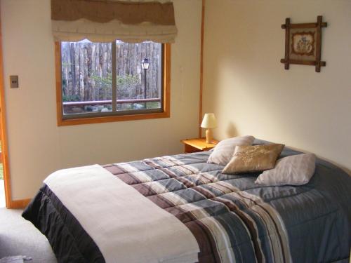Tempat tidur dalam kamar di Big Bang Patagonia - Traveler Assistance