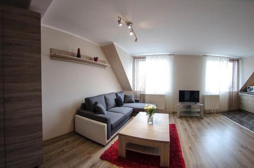 Posezení v ubytování Apartamenty Giżycko