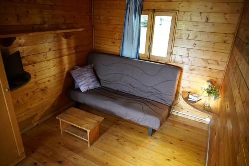 Cama o camas de una habitación en Camping La Vall d'Hostoles