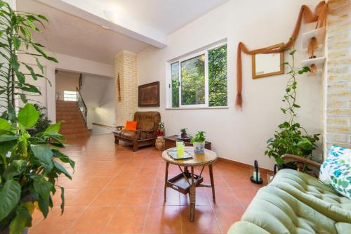 a living room with a couch and a table at Apartments Mateljak in Gradac