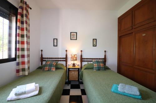 Posteľ alebo postele v izbe v ubytovaní Villa Corbera by SpainSunRentals 1114
