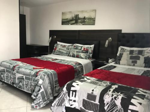 Ein Bett oder Betten in einem Zimmer der Unterkunft Hotel Casa Modelia