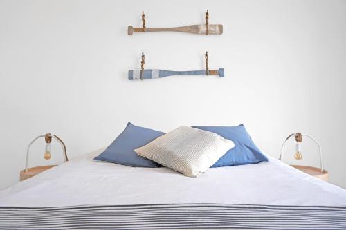 Кровать или кровати в номере Mood Lodging - Caldas & Ocean