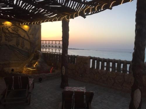 a view of the ocean from a building at Al-Madina Tower Apartments in Marsa Matruh