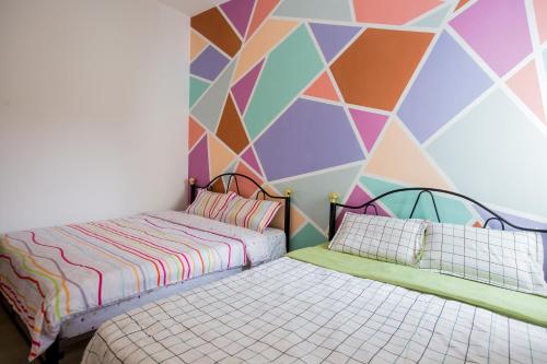 Krevet ili kreveti u jedinici u objektu ICOLOR HOME & STAY CH1