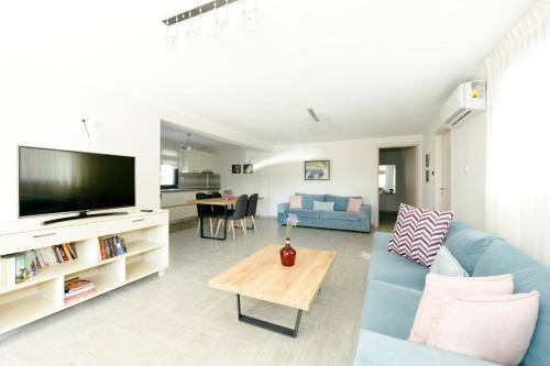Televízia a/alebo spoločenská miestnosť v ubytovaní W2 Rooms