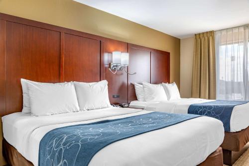 Ένα ή περισσότερα κρεβάτια σε δωμάτιο στο Comfort Suites Savannah Gateway I-95