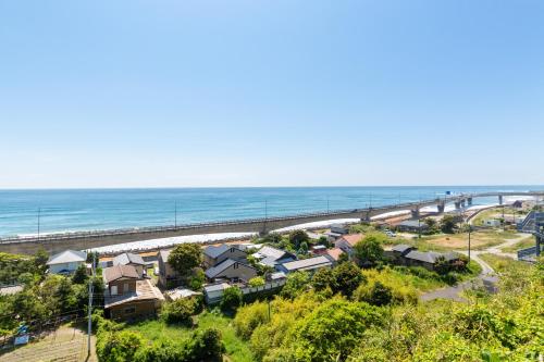 a view of the beach and the ocean at Hotel Terrace The Square Hitachi in Hitachi