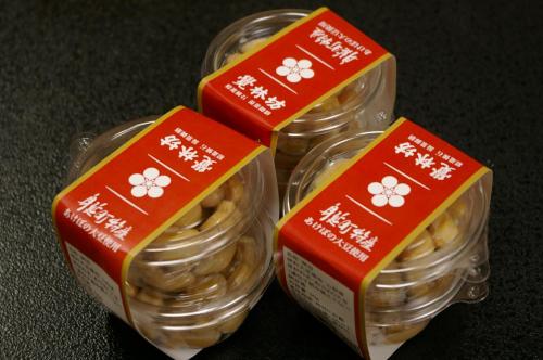 three plastic containers of food with red labels on them at Temple Lodging Shukubo Kakurinbo in Minobu