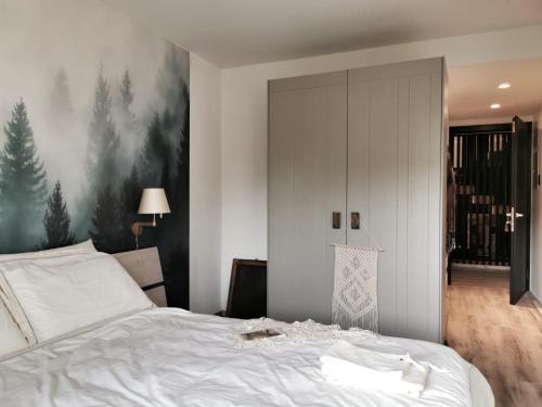 Postel nebo postele na pokoji v ubytování Appartamenti e B&B Casa Ester