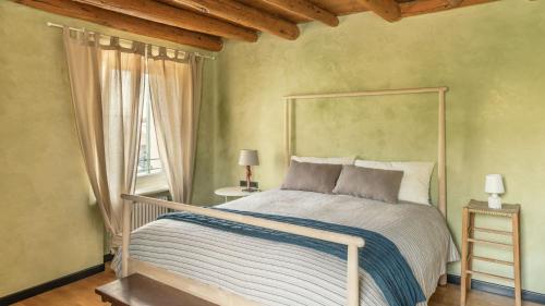 Ένα ή περισσότερα κρεβάτια σε δωμάτιο στο A casa di Hugo - Relais Valpolicella