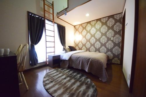 Lova arba lovos apgyvendinimo įstaigoje The Nest Ikebukuro House