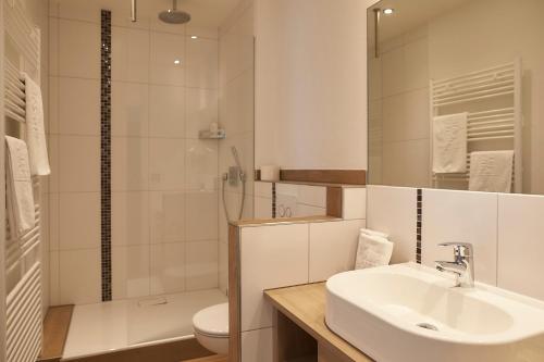 Koupelna v ubytování Flair Hotel Grüner Baum