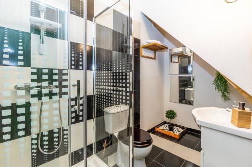 a bathroom with a toilet and a sink at Lameira Da Longra - Wellness Retreat in Tomar