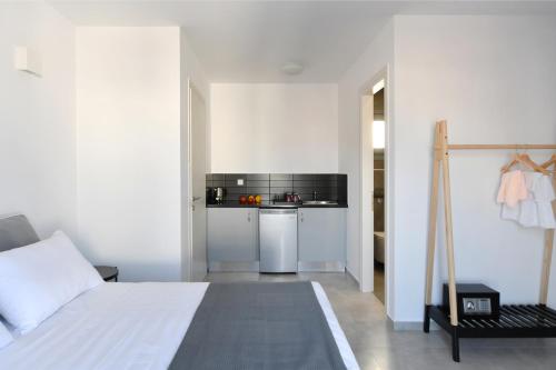 Dapur atau dapur kecil di Harmony Apartments