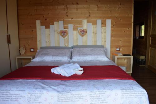 Postel nebo postele na pokoji v ubytování 2 CUORI E UN B&B