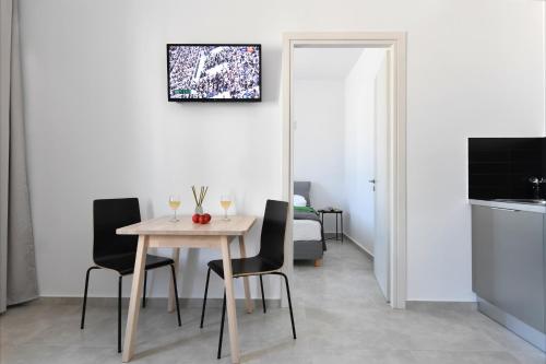Televisyen dan/atau pusat hiburan di Harmony Apartments