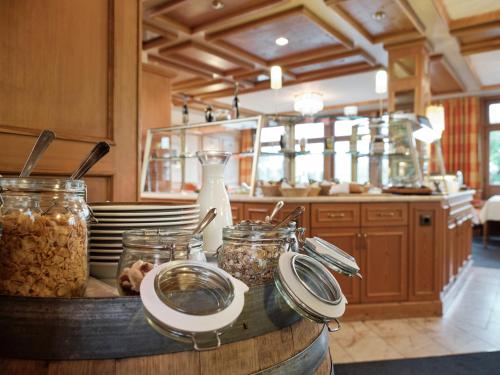 a kitchen with jars of food on a counter at Badhotel Restaurant Stauferland in Bad Boll