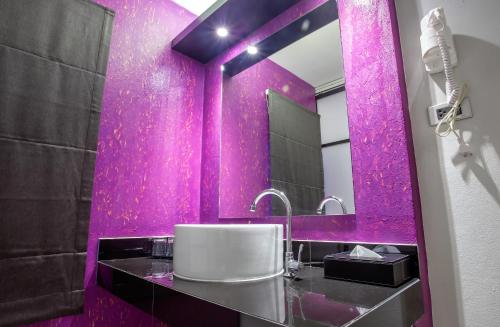 Koupelna v ubytování Nouvo City Hotel