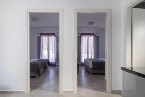 Katil atau katil-katil dalam bilik di Harmony Apartments