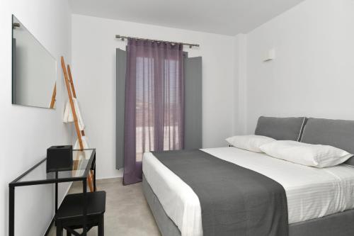 Katil atau katil-katil dalam bilik di Harmony Apartments