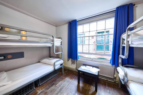 Bed in 4-Bed Female Dormitory Room with External Shared Bathroom
