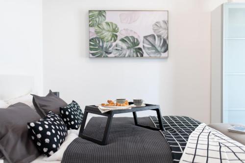 a living room with a coffee table on a couch at Apartment Tara & Ana in Pula