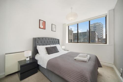 Кровать или кровати в номере 2 Bed Cosy Apartment in Central London Fitzrovia FREE WIFI by City Stay Aparts London
