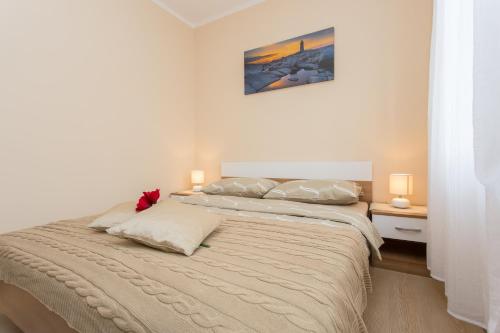 Postel nebo postele na pokoji v ubytování Apartment Martina Soline