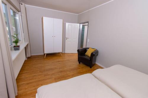 Una cama o camas en una habitación de Weingut Gerd Müllers