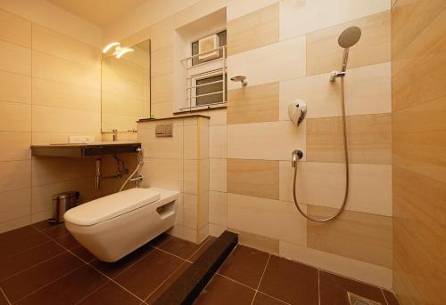 Koupelna v ubytování Hotel Kamar Residences and Banquets