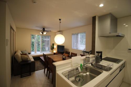 A kitchen or kitchenette at HOPE VILLA ONNASON