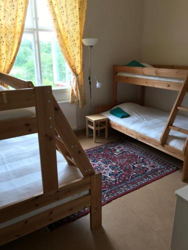 Postel nebo postele na pokoji v ubytování Lysekil-Brastad