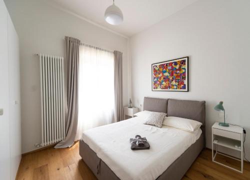 Кровать или кровати в номере Gualchierina apartment