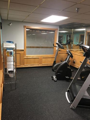 a gym with two exercise bikes in a room at Baymont by Wyndham Keystone Near Mt. Rushmore in Keystone