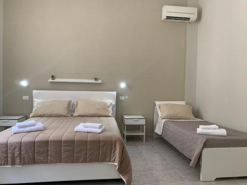 Una cama o camas en una habitación de Correttori House