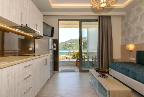 a kitchen with a view of the ocean at Villa Regina in Keri