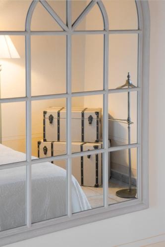 a view of a bedroom through a window at C'eraunavolta in Narni