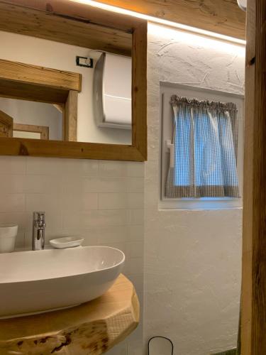 Ванна кімната в Guest House In Contrà
