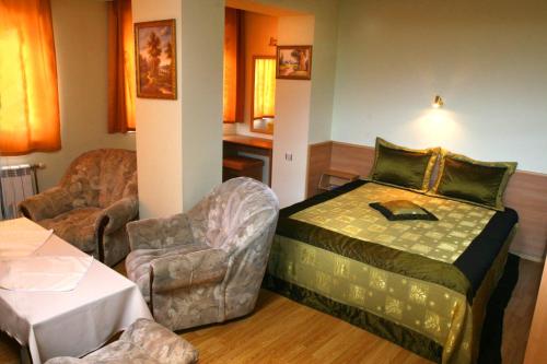 Ένα ή περισσότερα κρεβάτια σε δωμάτιο στο Hotel Mehdjarel