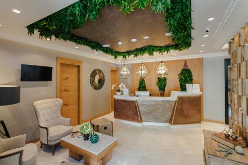 a lobby with a reception desk and a waiting room at Boutique Hotel Casa del Mare - Vizura in Kotor