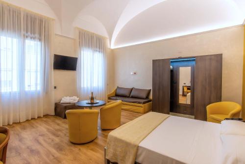 Hotel Santa Prisca tesisinde bir oturma alanı