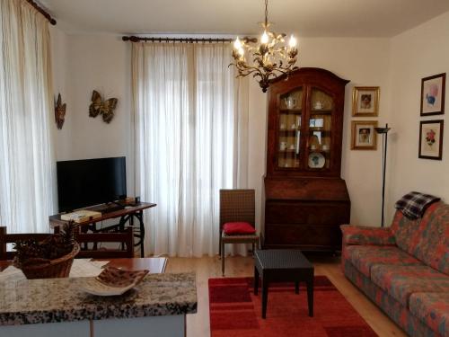 TV a/nebo společenská místnost v ubytování Appartamento Collini