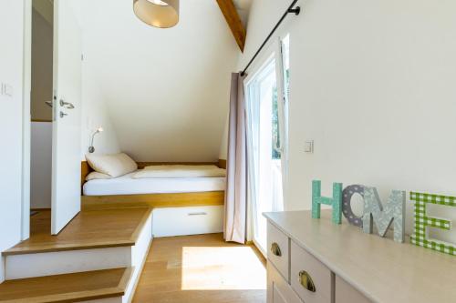 Katil atau katil-katil dalam bilik di Ferienhaus Bachschlössle