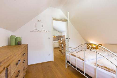 Postel nebo postele na pokoji v ubytování Ferienhaus Bachschlössle